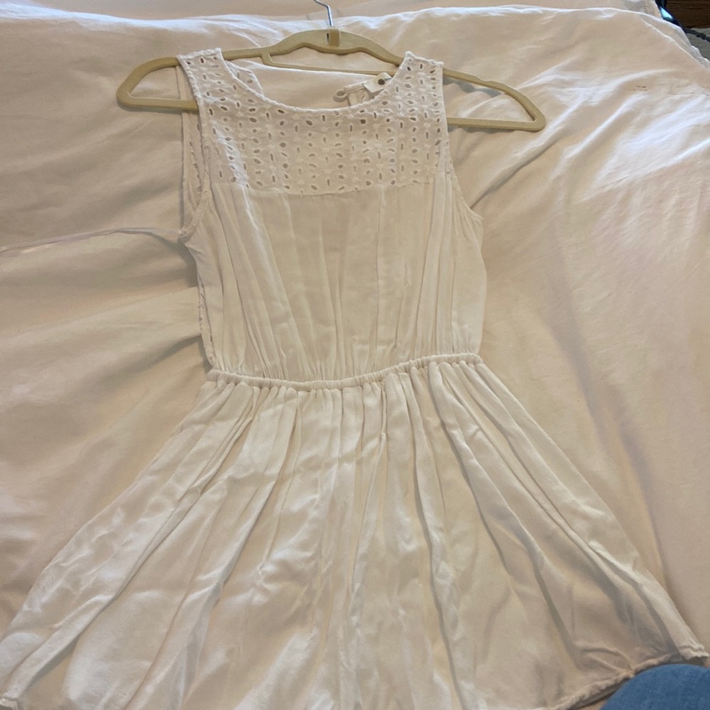 White romper with lace top.